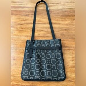 SALVATORE FERRAGAMO Gancini Messenger Cross Body in printed coated canvas.